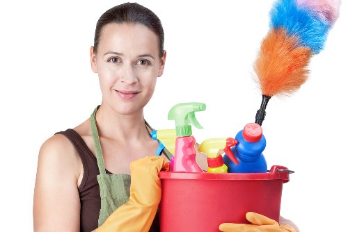 Carpet cleaning team following safe working practices