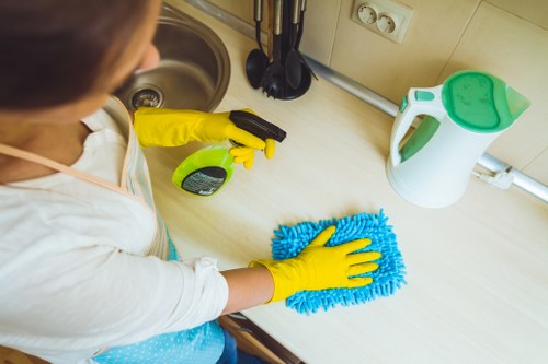 Professional office cleaners working in a Barnes workplace reception