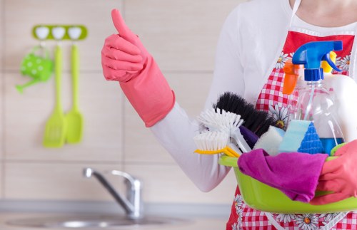 Local Barnes cleaner preparing a spotless living room